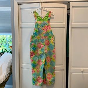 Lilly Pulitzer tropical print overalls.